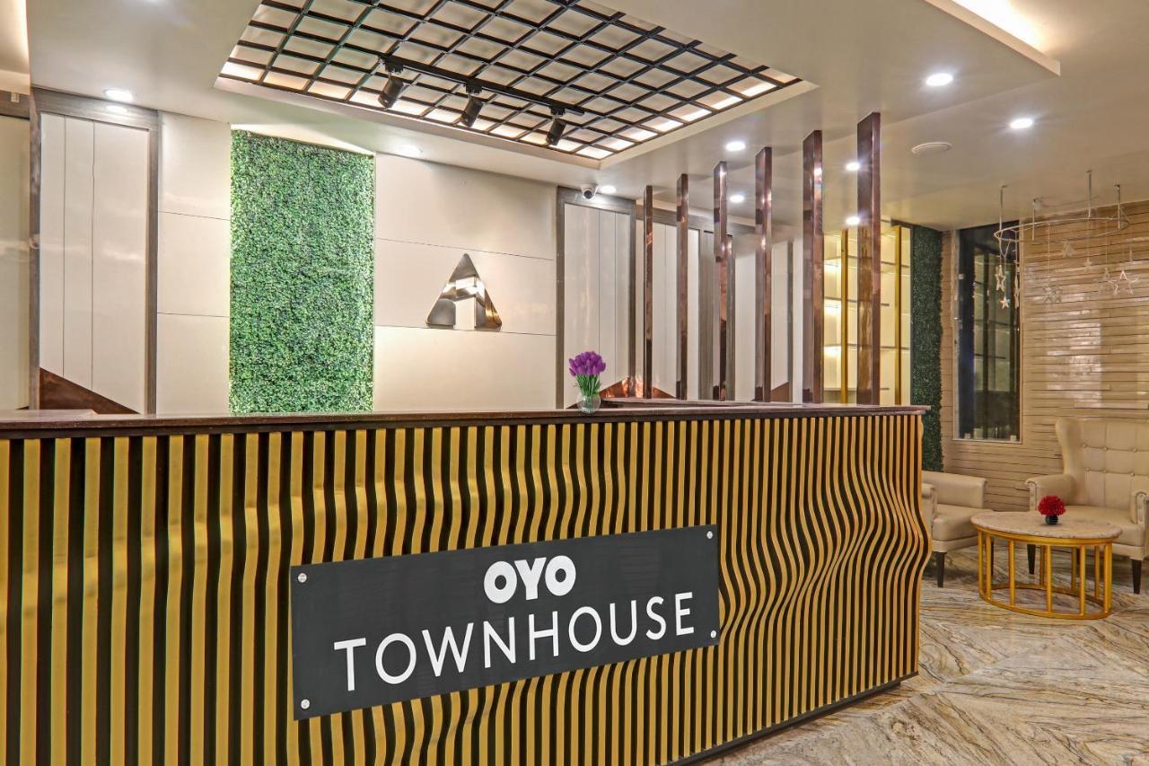 Super Townhouse Hotel Impact Chinhat Extérieur photo